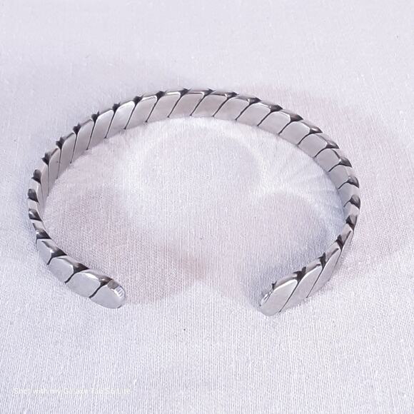 Silver Tone Twisted Cuff Bracelet - Picture 5 of 8